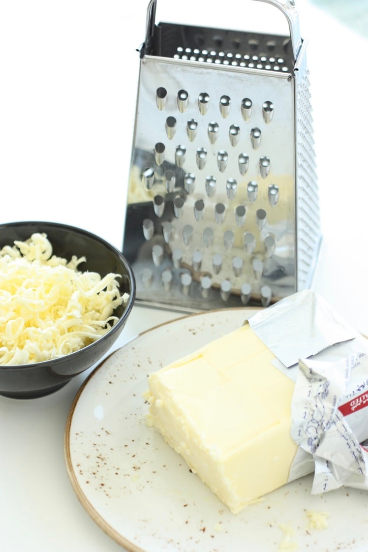 Quickly soften butter by grating it