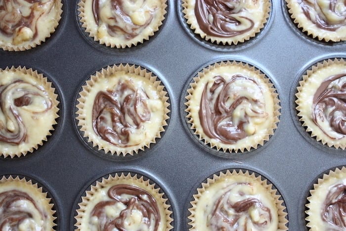 Nutella and Banana Muffins uncooked in the muffin tray