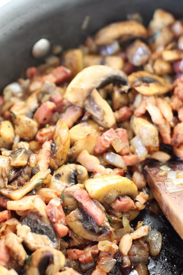Mushrooms and bacon cooking