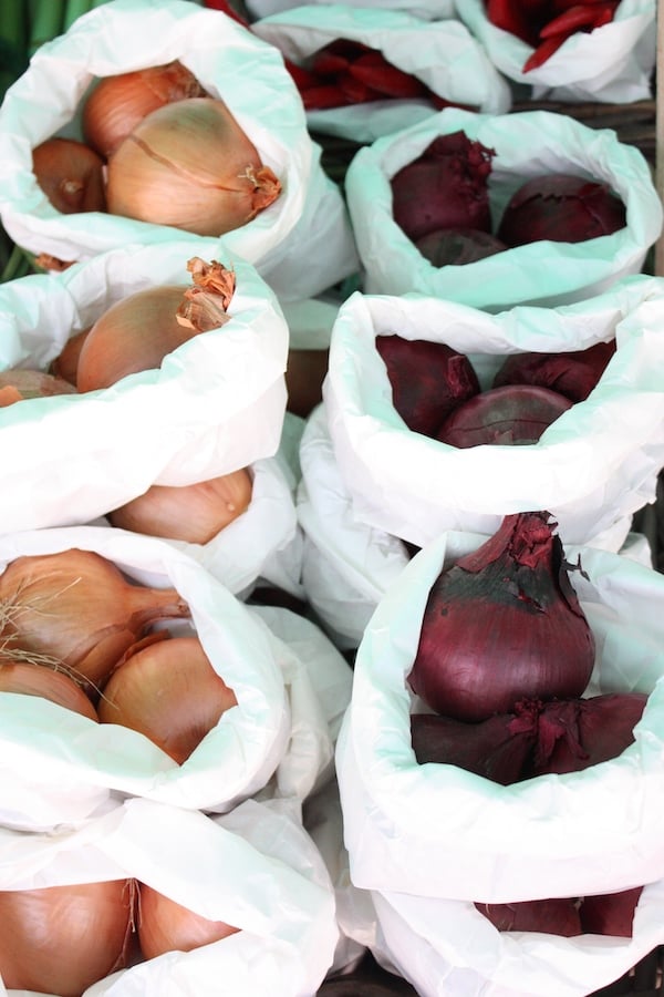 Onions in paper bags
