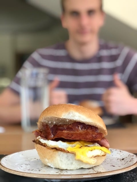 Bacon and egg sandwich on a white roll