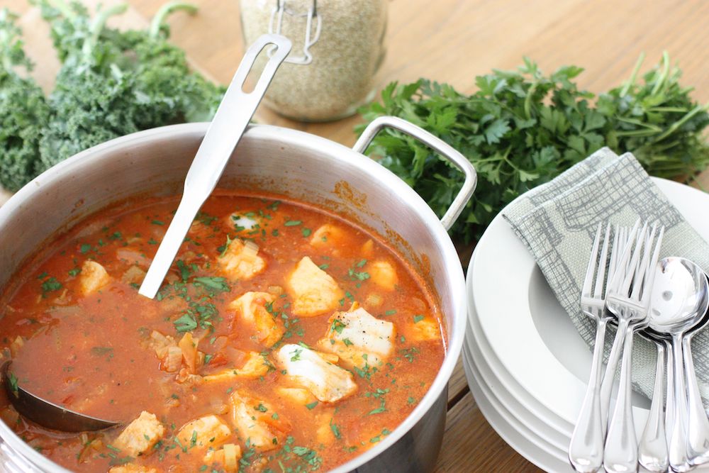 Sicilain Fish Stew in a large metal pan