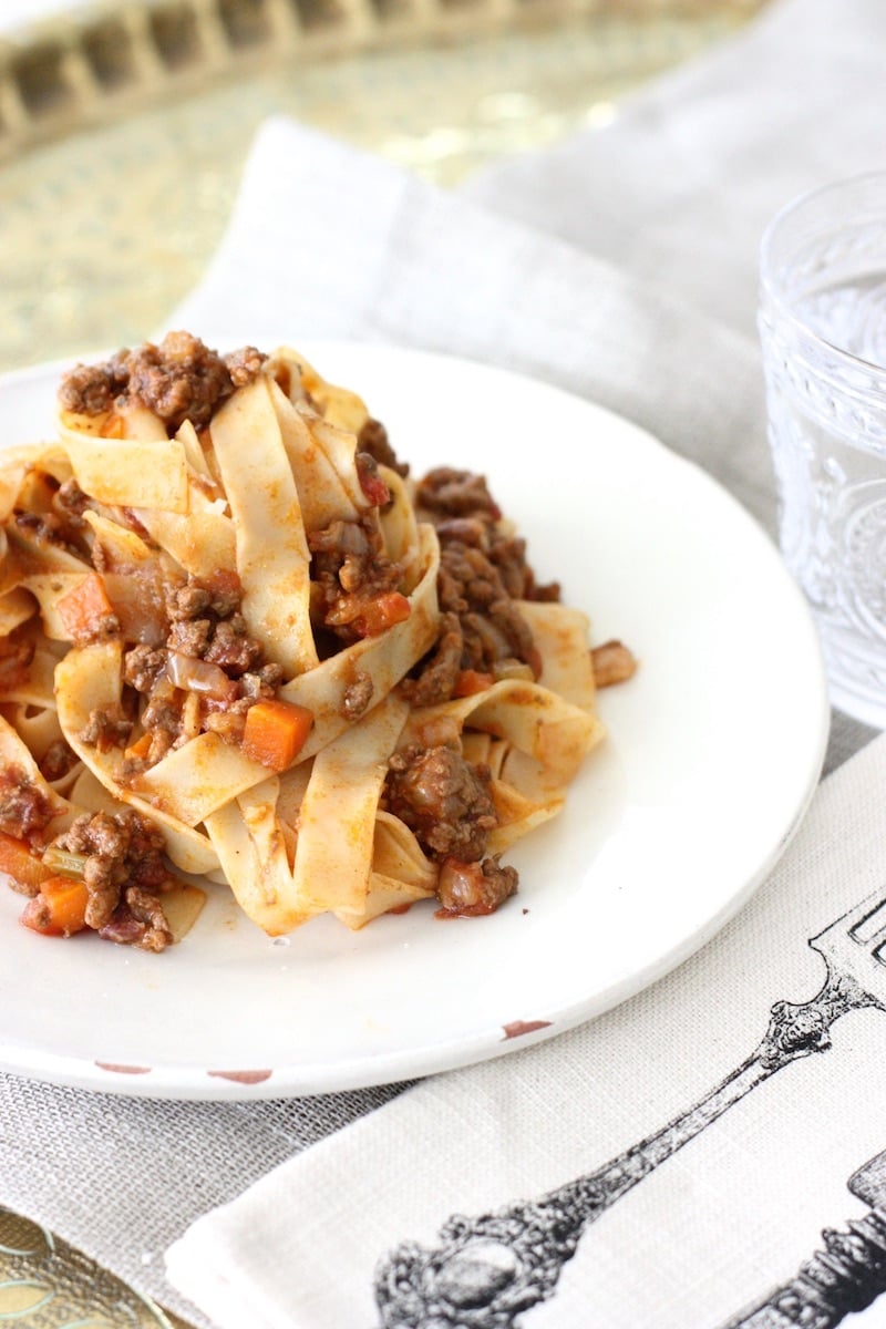 Bolognese sauce with pasta in a white dish