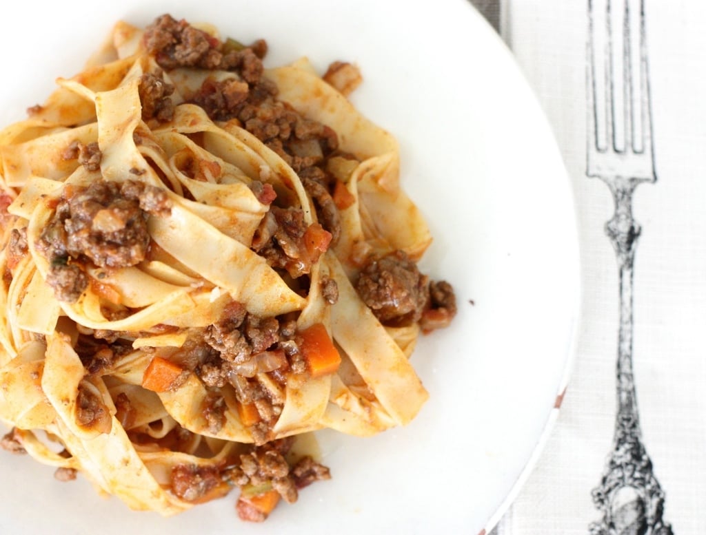 Bolognese sauce with pasta in a white dish