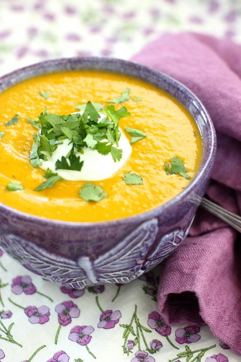 Sweet Potato, Ginger and Coconut Soup in a purple bowl