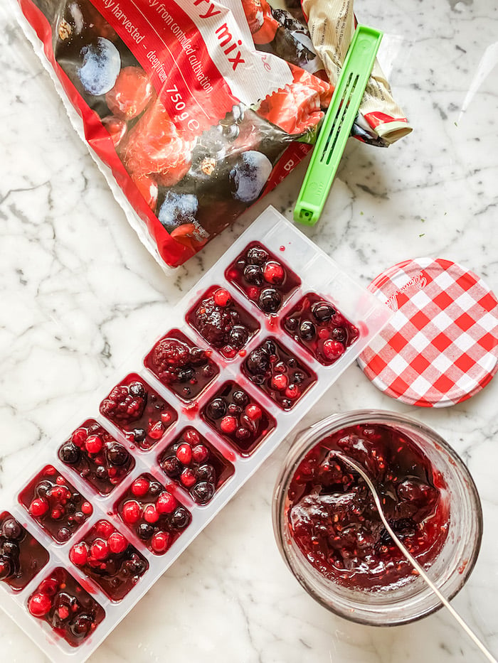 Berry compote prepared and ready to freeze in an ice cube tray