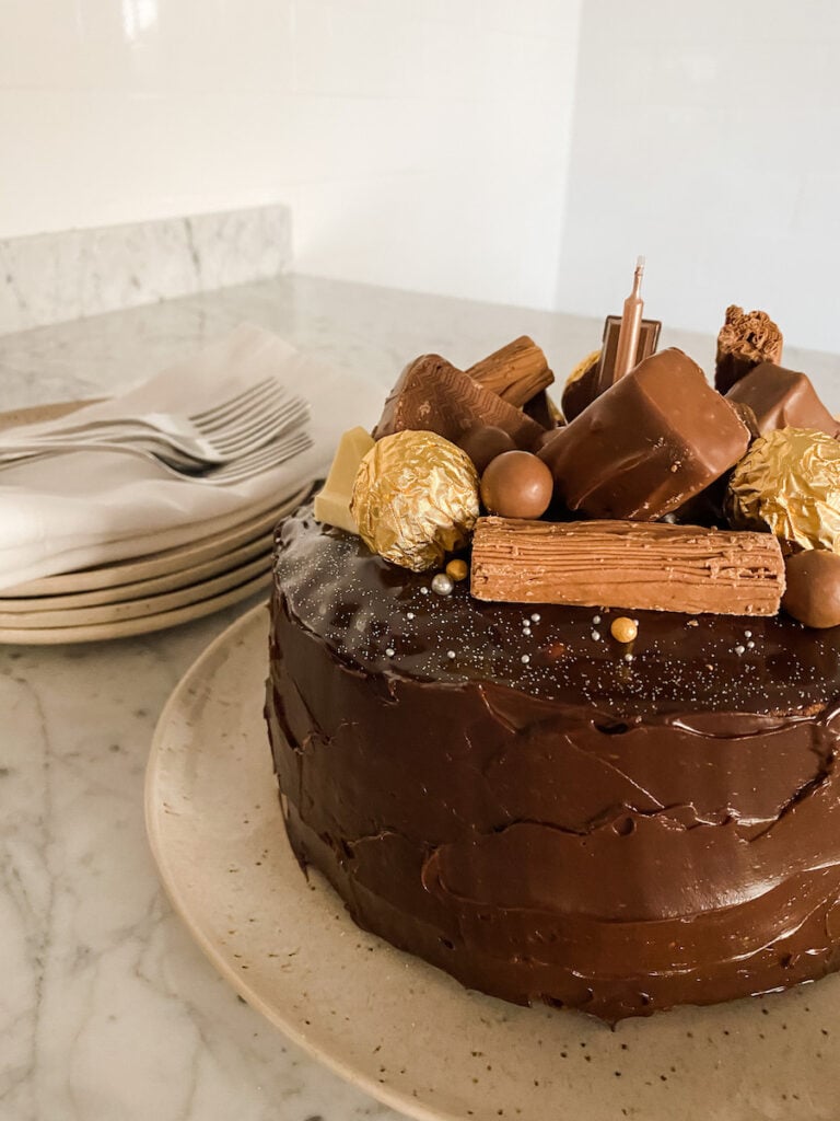 Chocolate Ganache covering a birthday cake